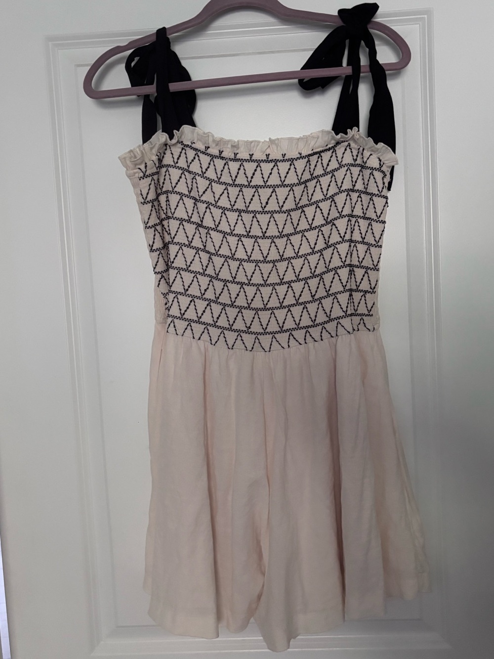 Francesca's Cream & Black Smocked Neckline Romper